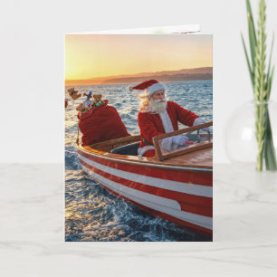 Kerstman die een speedboot bestuurt kaart