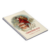kerstman die in een schoorsteen klimt notitieboek (Rechterzijde)