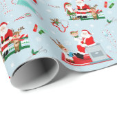 Kerstman Dokter met Kerstman Lichtblauw Cadeaupapier (Rol Hoek)