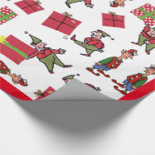 Kerstman Elfen rood glanzend inpakpapier (Hoek)