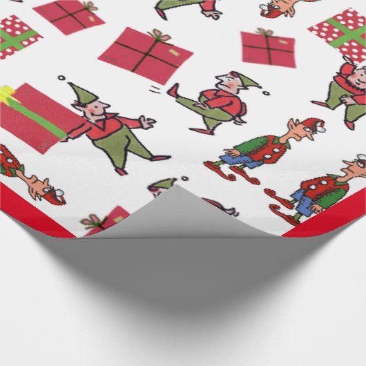 Kerstman Elfen rood glanzend inpakpapier (Hoek)