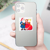 Kerstman en meisje met een cadeautas sticker (Telefoon)