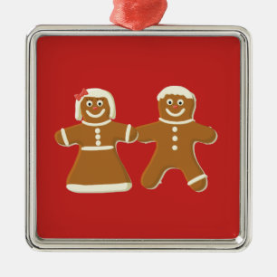 Kerstman en -vrouw op rood metalen ornament