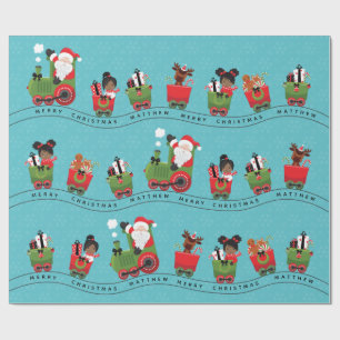 Kerstman en zwart meisje op trein cadeaupapier