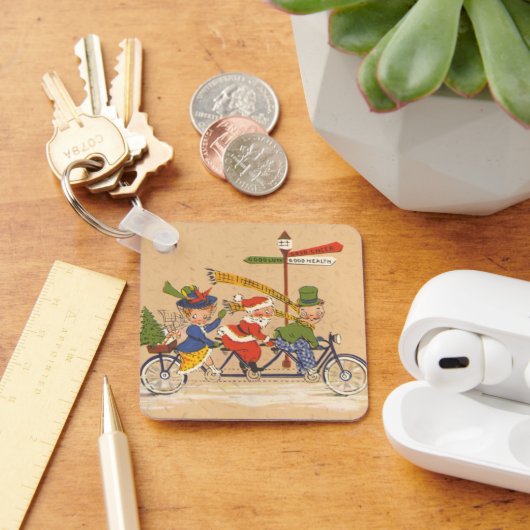 Kerstman fietst op een tandem sleutelhanger (Bureau)