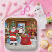 Kerstman geeft cadeautjes op eerste kerstdag papieren bordje (Feest)