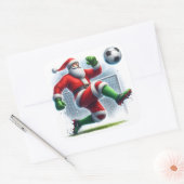Kerstman geniet van een voetbalwedstrijd in de win vierkante sticker (Envelop)