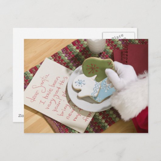 Kerstman hand met koekjes en notitie feestdagenkaart (Voorkant / Achterkant)