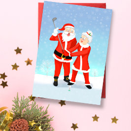 Kerstman helpt mevrouw Claus met haar golfswing Kaart