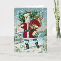 Kerstman in de sneeuw met trommel en boom