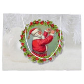 Kerstman in een grote tas met wieltjes large cadeautasje (Achterkant)