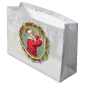 Kerstman in een grote tas met wieltjes large cadeautasje (Achterkant Gekanteld)