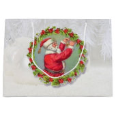 Kerstman in een krans grote cadeautas (Voorkant)