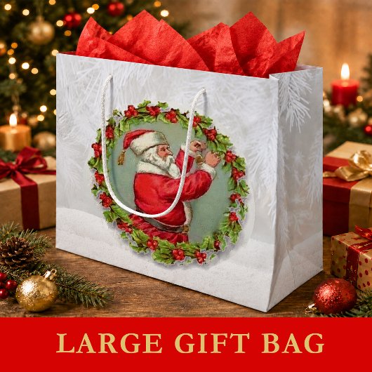 Kerstman in een krans grote cadeautas