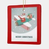 Kerstman in een vliegtuig keramisch ornament (Links)