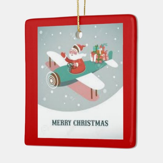 Kerstman in een vliegtuig keramisch ornament (Links)