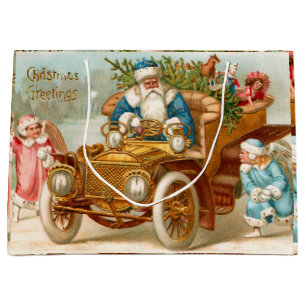 kerstman in Gold Car en kerstangels Groot Cadeauzakje