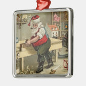 Kerstman in werkplaats metalen ornament (Links)