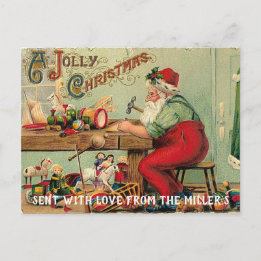 Kerstman in zijn werkplaats maakt speelgoed Vintag Feestdagenkaart