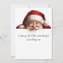 Kerstman kijkt grappige kerstkaart