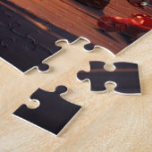 Kerstman leest een boek bij kaarslicht legpuzzel (Zijkant)