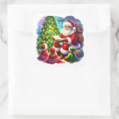 Kerstman leest een verhaal bij de kerstboom vierkante sticker (Tas)