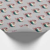 Kerstman leest verboden boeken cadeaupapier (Hoek)