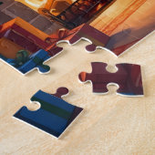 Kerstman levert geschenken door een warme kersthaa legpuzzel (Zijkant)