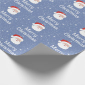 Kerstman met blauwe achtergrond en sneeuwvlokken cadeaupapier (Hoek)