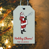 Kerstman met champagnefles cadeaulabel