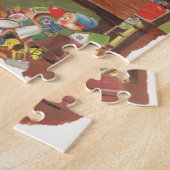 Kerstman met elfen in de werkplaats legpuzzel (Zijkant)