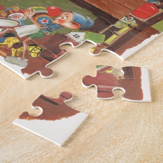Kerstman met elfen in de werkplaats legpuzzel (Zijkant)