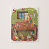 Kerstman met elfen in de werkplaats legpuzzel (Verticaal)