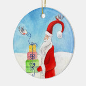Kerstman met geschenken en ornament voor vogels (Links)