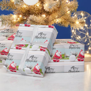 Kerstman met golfbal cadeaupapier