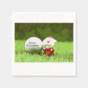 Kerstman met golfbal en kerstgolfer servet