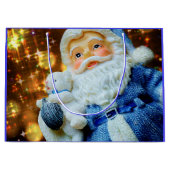 kerstman met gouden rugzak groot cadeauzakje (Voorkant)