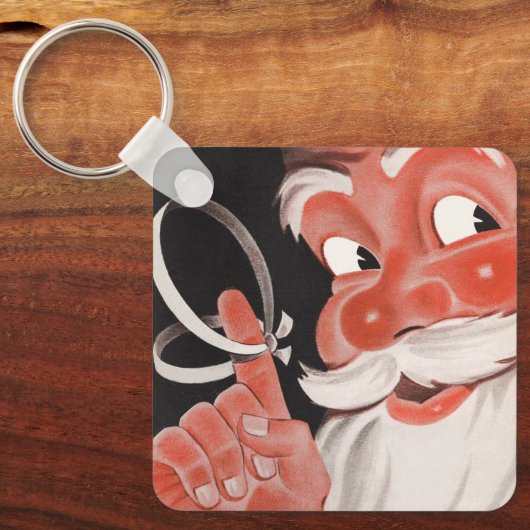 Kerstman met Herinneringsstring op Vinger Sleutelhanger (Voorkant)
