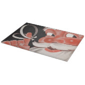 Kerstman met Herinneringsstring op Vinger Snijplank (Hoek)