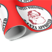 Kerstman met kerstgoedkeuring voor de werkshop van cadeaupapier (Rol Hoek)