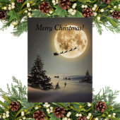  kerstman met volle maan vliegend rendier feestdagenkaart