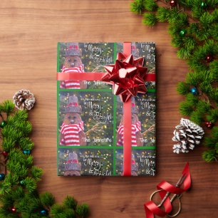 Kerstman met vrolijk heldere script en lieve motie cadeaupapier