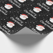 Kerstman met zwarte achtergrond en sneeuwvlokken cadeaupapier (Hoek)