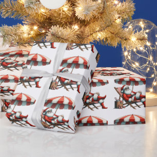 Kerstman onder een strandparasol Kerstmis Cadeaupapier