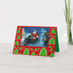 Kerstman op een motorfiets/chrstmasbomen feestdagen kaart