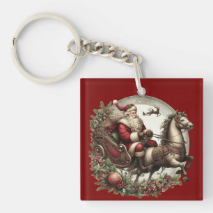 Kerstman op een slee en een paard sleutelhanger