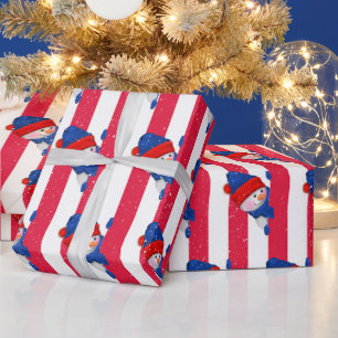 kerstman op strepen en sneeuwvlokken cadeaupapier