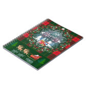 Kerstman rijdend in een slee wordt geleid door ren notitieboek (Linkerzijde)