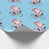 Kerstman rijdt een fiets cadeaupapier (Hoek)