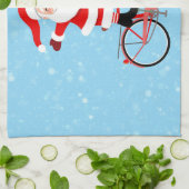 Kerstman rijdt een fiets theedoek (Gevouwen)